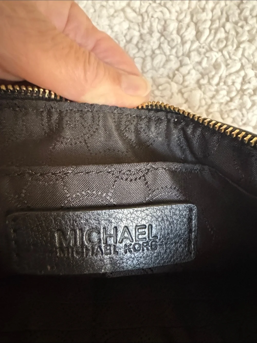 Michael Kors Black Leather Grommet Detail Wristlet with Gold Hardware
